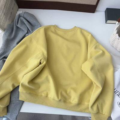 Petite Figure Wearing Lemon Yellow Cartoon Embroidered Crop Sweatshirt